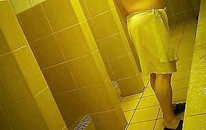 Naked men in public pool shower