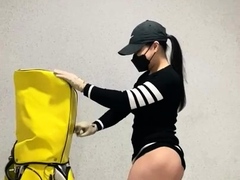 Pantyless Oriental mistress practicing her golf swing