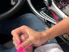 Sensual teen gives her boyfriend a helping hand in the car