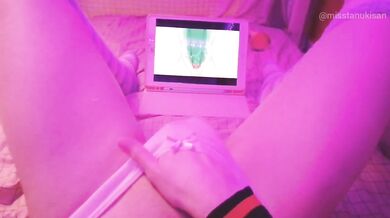Kawaii girl squirts watching lesbian hentai then pisses herself raw