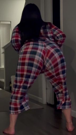 Blonde woman in plaid pajamas