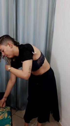 A store dressing room is used by a perverted couple.