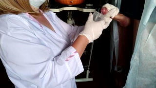 Caring female doctor taking a cum analysis on her knees