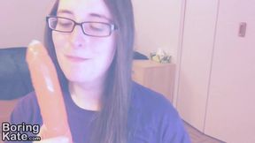 Kate sucks a big dildo