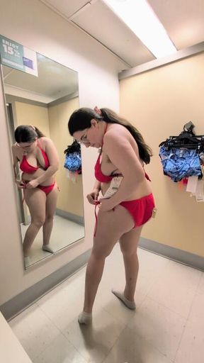 Trying on bikinis in the dressing room