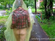 Risky flash of boobs and butt in the rain in a transparent raincoat