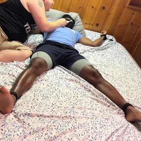 Bound black jock Elijah tickled on feet by chubby dom Matt