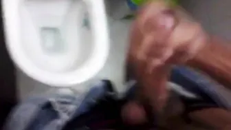 Pakistani twink strokes his big uncut cock in bathroom