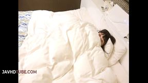 A private moment with an Asian beauty in stockings indulging in sensual foot fetish play