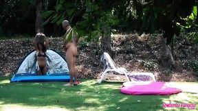 Enjoying holidays with a bottle and a tent