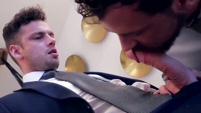 Horny guys in suits are having gay sex during a coffee break