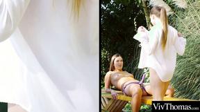 ”Pretty lesbian girls expertly make each other cum by using a strap on”