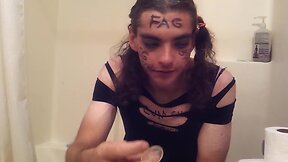 Disgusting crossdresser plays with cum and ash tray