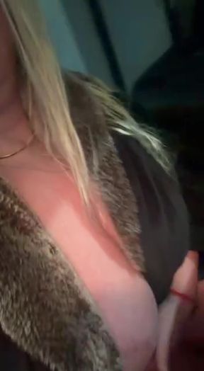 Blonde woman in a fur coat