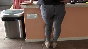 pissing her tight jeggings behind the counter