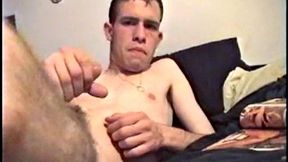 Putting his hairy ass and balls in our face, Nate gets himself hard, with a little help from some porn magazines. The young man kneels over his porn, and a box, with a pillow tucked between his legs.
