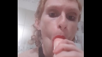 Femboy twink loves giving a sloppy blowjob to a big dildo