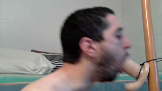 Suck and fuck Bandit dildo while in chastity