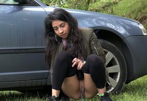 Amateur shameless brunette squats down and pees near the car