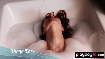 Bubble covered Ukrainian beauty Diana Lark indulging herself in the bath
