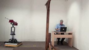 Machine whips bare back