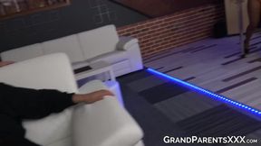 Older couple having sex while teen strippers are dancing