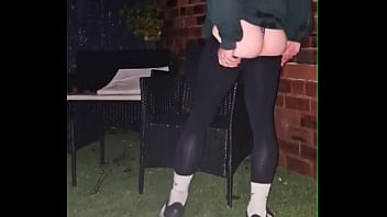 Cute boy teasing outside in leggings and panties