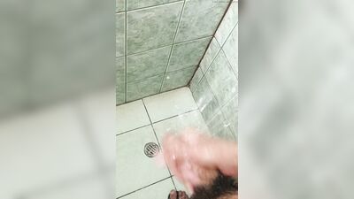 man in the shower ends up masturbating until he comes - watch the end