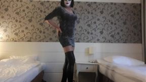 Crossdresser in gray velvet mini dress