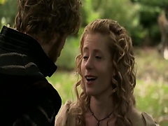 Krystin Pellerin making out with a guy against a tree in