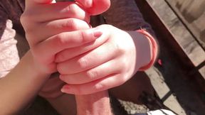 Jerking off his cock on the balcony