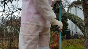 Diaper girl wets herself in public with transparent rain wear