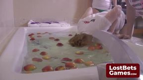 Four lesbians strip down while bobbing for apples