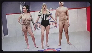 Intense Mixed Wrestling Match Ends with Standing Penetration