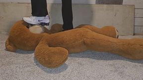Chrissy tramples big stuffy in purple nike shox