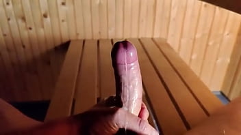 Slowmotion oil handjob in public sauna - cumshot