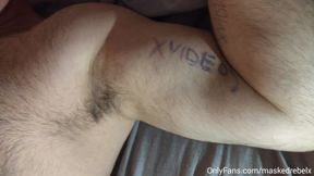 Man with big biceps masturbates his fat cock