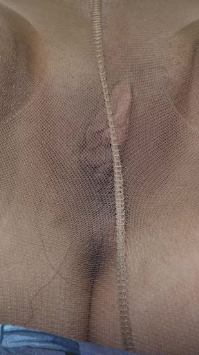 Stunning moment from &quot;Fingering and pissing in pantyhose! Beautiful brunette!&quot;