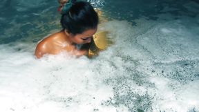 Big foam bathing with an asian model