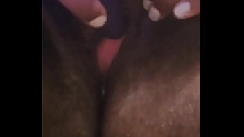 BLACK GIRL RUBBING CLIT WITH LOUD VIBRATOR