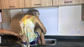 oiled and creamed hot girl gunged in a holiday caravan game