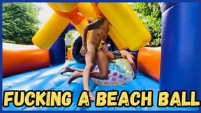 Fucking a giant beach ball