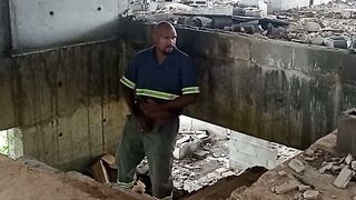 Amateur hunk masturbates in construction site while getting a hot handjob from a stranger