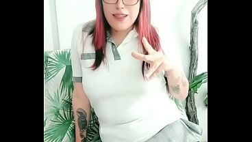 Latina student gets a facial in public booth