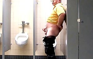 Masturbating in a public bathroom