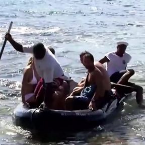 Three guys destroy a skinny blondes holes on the beach of an island