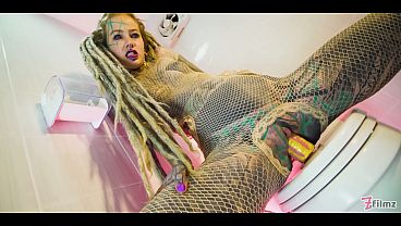 Skinny GF with dreads and tattoos pees and plays with anal toy