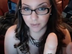 Nerdy Chick with glasses sucking dildo and masturbating