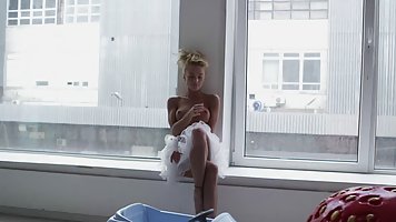 Julia Reutova is a sweet ballet dancer who likes to do her warm- up routine in panties only