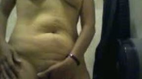 Flabby brunette whore shows her naked body on webcam